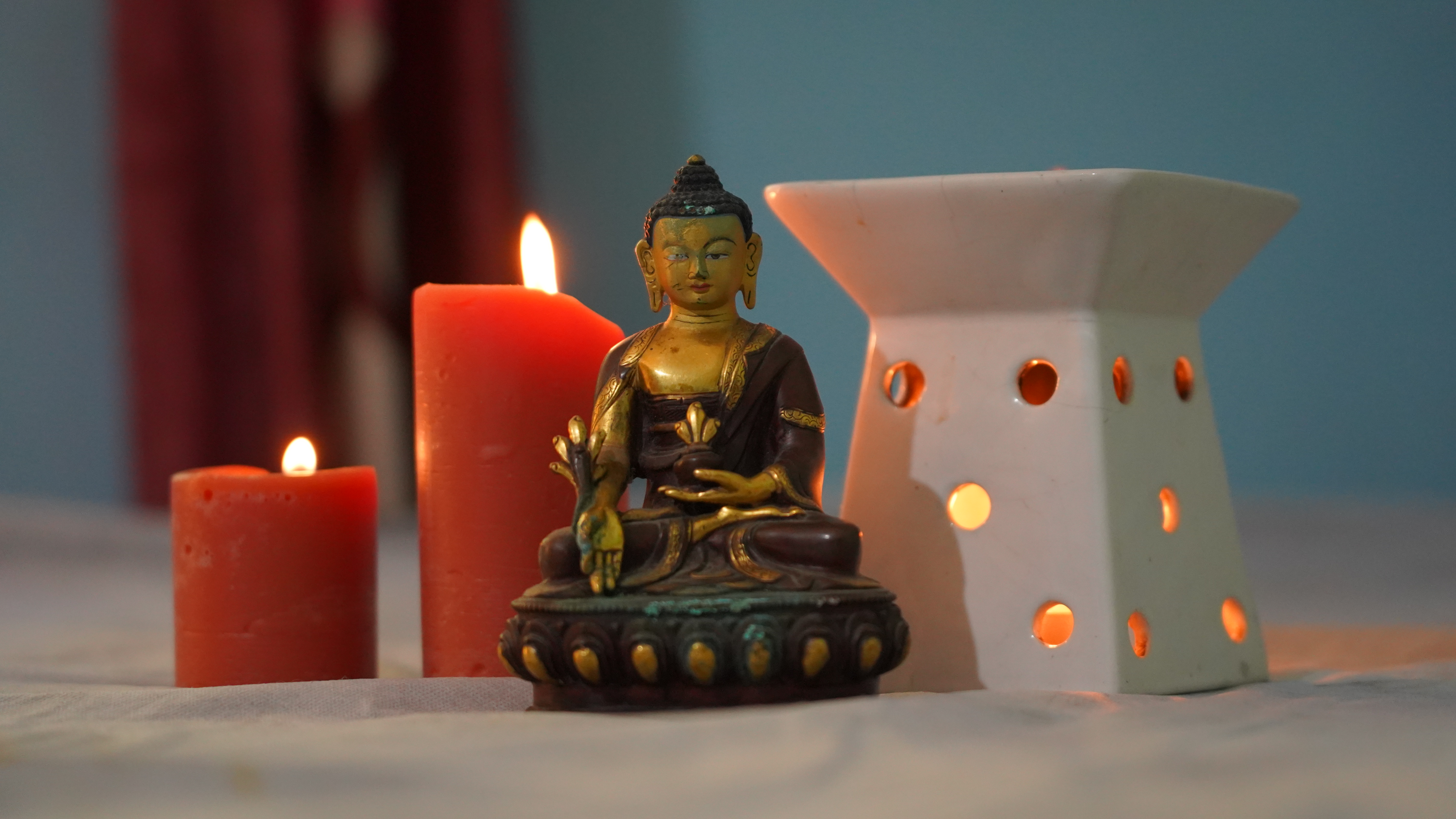Buddha statue and candles